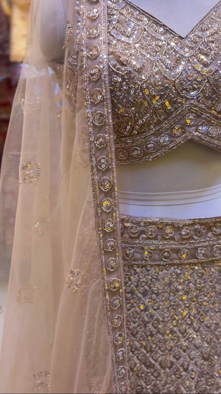 champagne gold heavy bids work lehenga