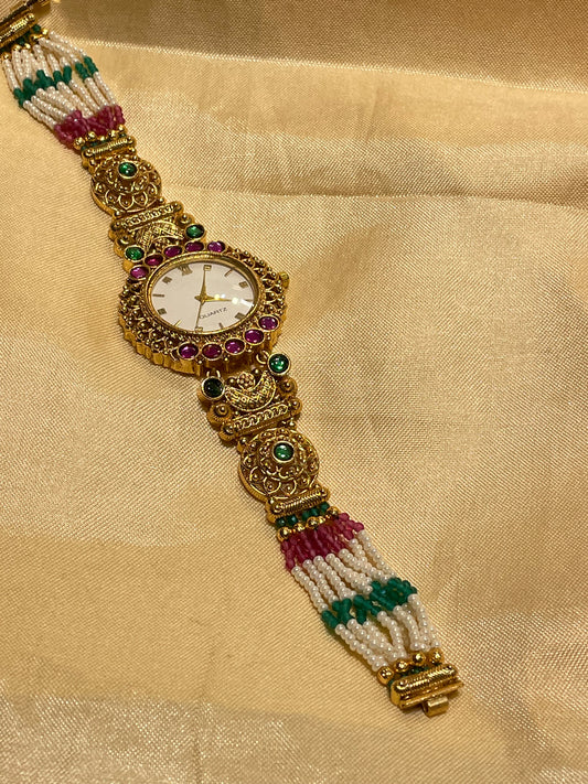 Antique gold  pearl and emerald Kundan watch
