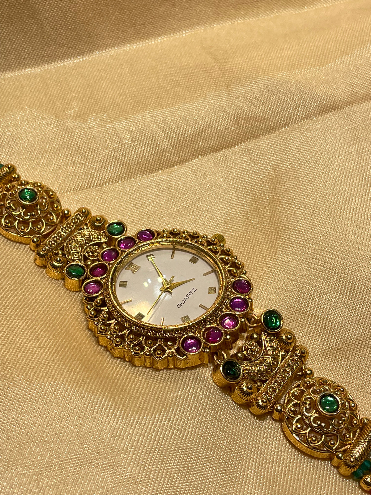 Antique gold  pearl and emerald Kundan watch
