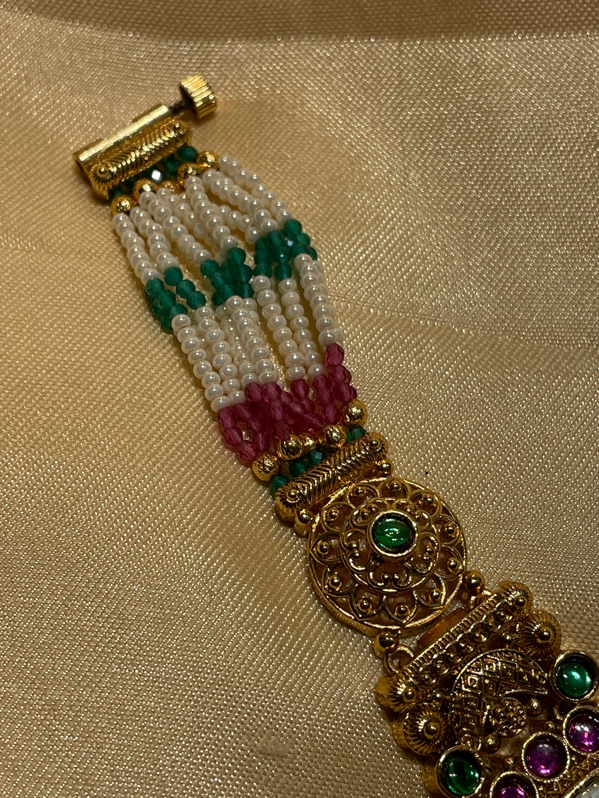 Antique gold  pearl and emerald Kundan watch